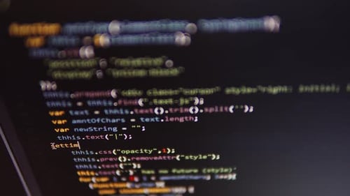 Programmer Coding on Computer