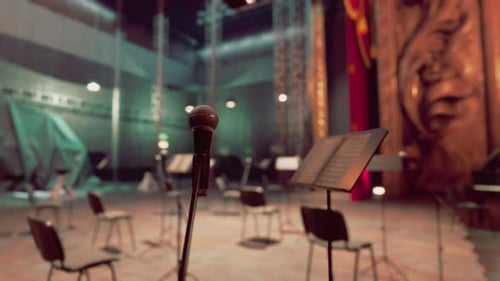 Atmospheric Empty Stage with Microphone and Music Stands