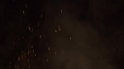 Close-up hot fiery sparkles and flame particles isolated spark.