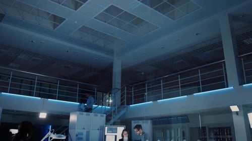 People Working in Modern Technology Control Room