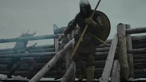 Medieval Soldiers in Armour, with Weapons Fighting on Battlements of Fortress