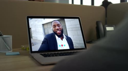 Consultant Meeting Video Call with Smiling Client Close Up Videoconference