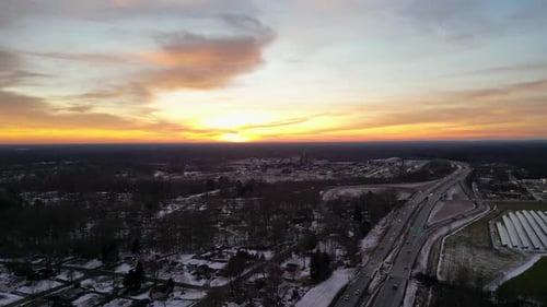Aerial View of Suburban Highway at Sunset in Winter