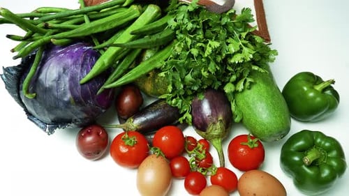Fresh Vegetables and Eggs from Grocery Bag, A variety of fresh vegetables and eggs
