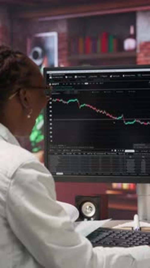Vertical Video Excited Day Trader Gaining Money After Selling Stocks