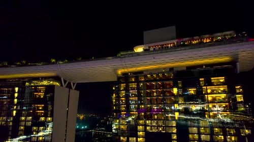 The Marina Bay Sands hotel and casino in Singapore, Malaysia. Drone closeup sideways shot.