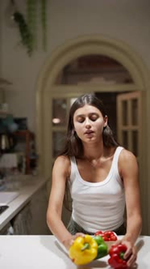 Woman Preparing Vegetables in Her Kitchen