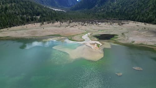 Winding River and Lake in Alps