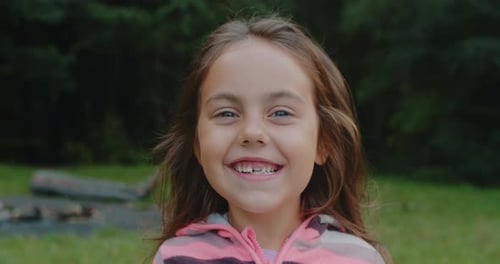 Portrait of a Little Girl in the Park