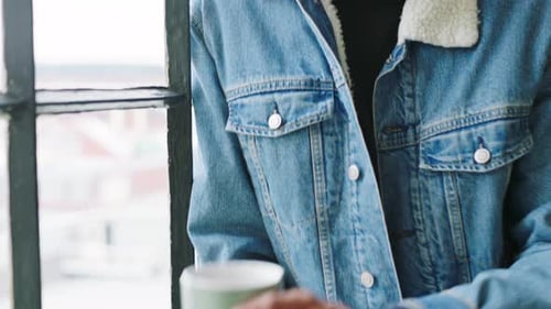 Creative workspace, drink coffee and businessman thinking in the office looking out window