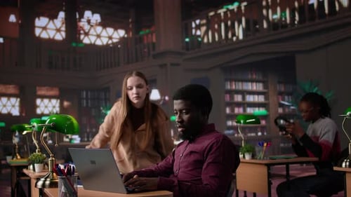 Diverse Students Working Together on a College Assignment at the Library