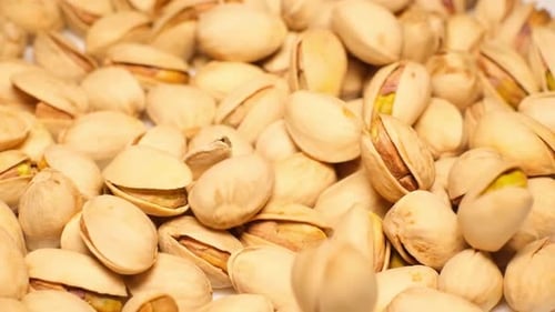 Close Up of Falling Pistachios