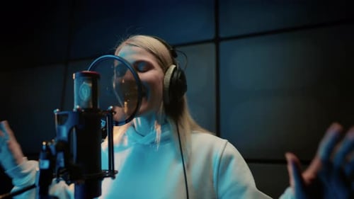 Woman Singer Recording Soundtrack in Modern Studio Talented Vocalist Singing Portrait of Young Adult