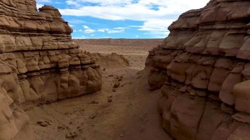 Beautiful aerial footage of canyons full of red rocks in utah