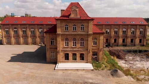 Beautiful old building in the reconstruction process. The retro look of the houses. Aerial drone foo