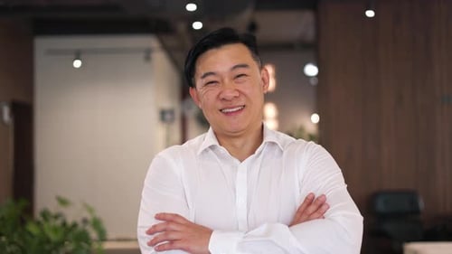 Smiling Business Man Portrait with Arms Crossed