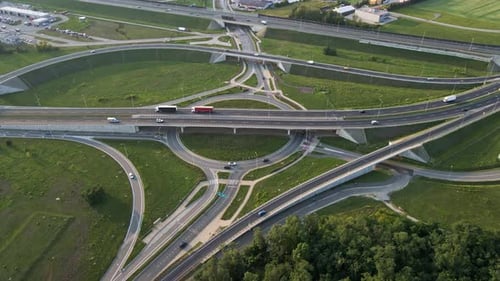 Cars Moving on Transport Road Junction in City Aerial View