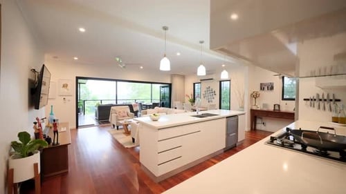 Interior of modern home with open kitchen and living