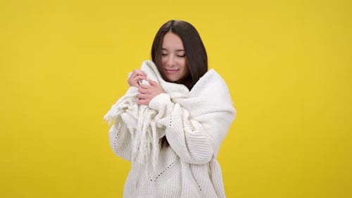 Cheerful Woman Wearing White Sweater and Scarf