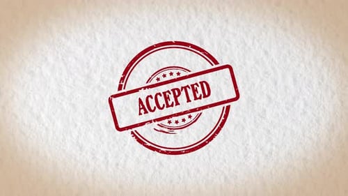 Hand Pressing Accepted Rubber Stamp Mark on Paper