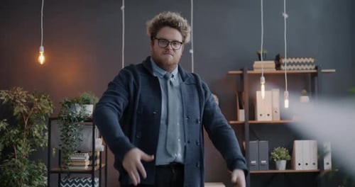 Loop of Businessman Throwing Then Catching Documents Looking at Flying Papers and Crossing Arms in