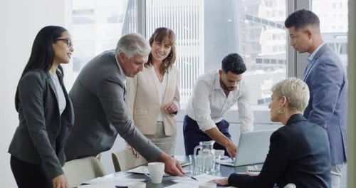 Diverse Business Team Collaborates in Modern Office