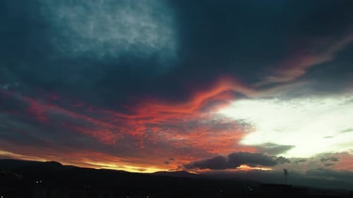 Dramatic Sunset over an Urban Landscape