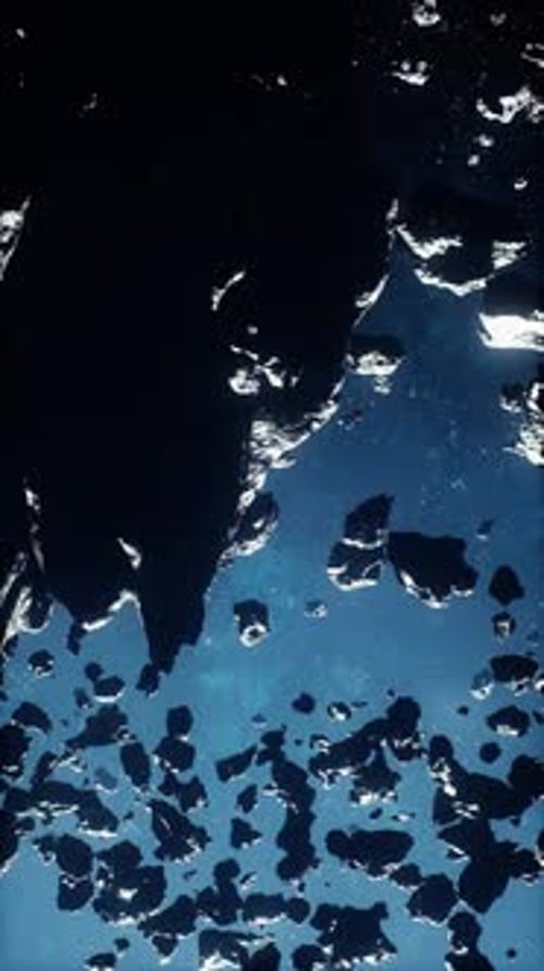 Vast Field of Perilous Asteroids Stretching Across a Misty Universe