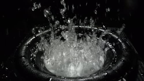 Water Splashing on Speaker Cone from Sound Vibrations