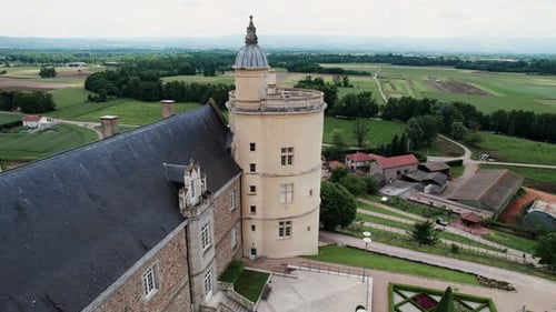 drone shot over the Chateau de Boutheon in Andrezieux Boutheon in the forez region, Loire departemen
