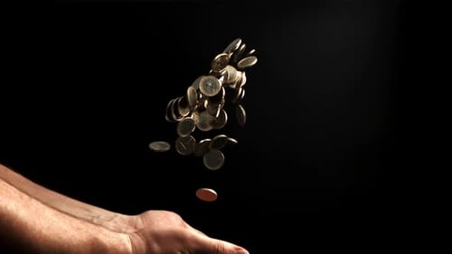 Hands Tossing Coins Up Filmed is Slow Motion 1000 Fps