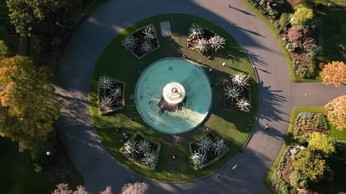 4K cinematic urban drone footage of a fountain in the carlton gardens of Melbourne