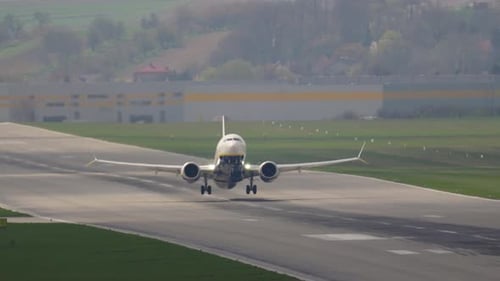 Journey into the sky as a passenger aircraft takes off from the runway