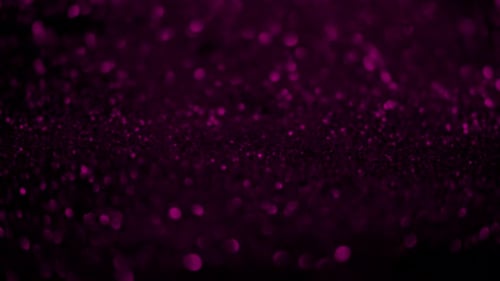 Glitter Particles Fashion Abstract On Black Background