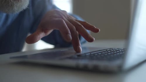 Finger Using Laptop Trackpad in Close Up