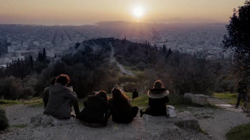 People watching sunset