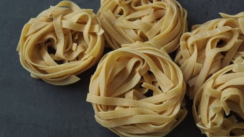Fresh Uncooked Pasta Nests Close Up