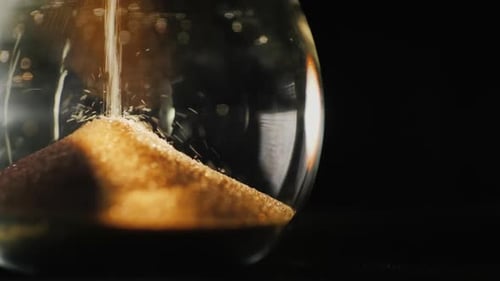 The Lower Part of the Hourglass the Little Grains of Sand Fall From Above Measuring the Time Slow