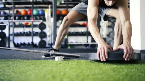 Unrecognizable Man Lifting Barbell Gym Motivation