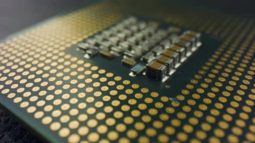 Electronic computer hardware technology close up dolly shot of motherboard digital chip