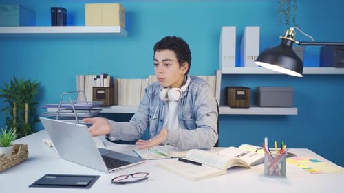The young man who started to get angry when what he saw on the laptop.