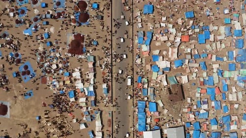 Overhead View Of Locals Walking In The Road Between The Paprika Market In Alaba Kulito Town In Ethio
