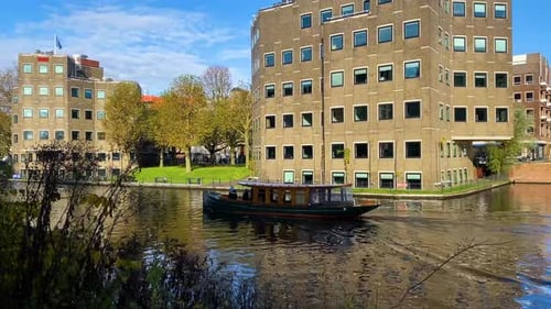 Seeing houses in Amsterdam from the canal and air