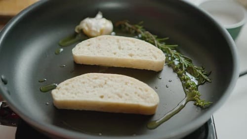 Frying Bread Slices with Herbs and Garlic