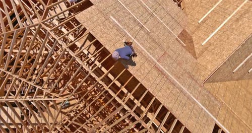 Construction Worker Building House Roof Aerial View