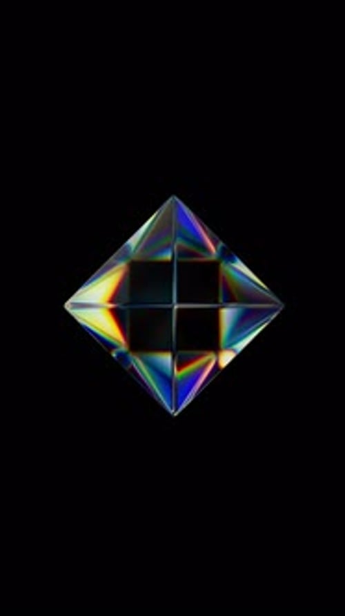 Objet géométrique brillant rotatif transparent 3D avec effet de dispersion, réflexion des couleurs arc-en-ciel