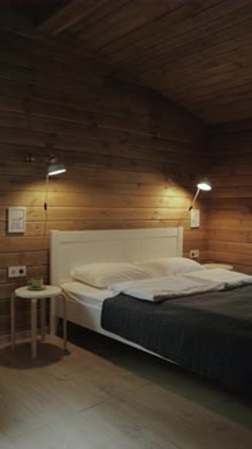 Cozy Wood-Paneled Bedroom Interior with Double Bed