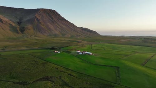 Stunning Countryside in Iceland Farmhouses in a Northern Country Hilly Landscape on a Sunny Day