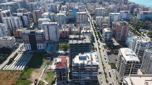 Aerial Video of Tower Crane Assisting Multi Floor Build