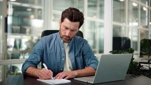 Manager Preparing for Presentation Checks Documents Does Paper Work